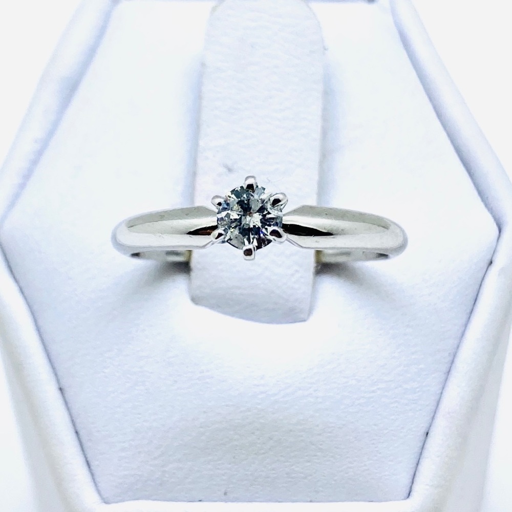 14k white gold and diamond solitaire ring
